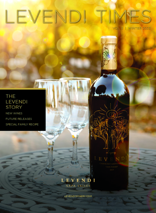 newsletter cover page, wine bottle and two glasses