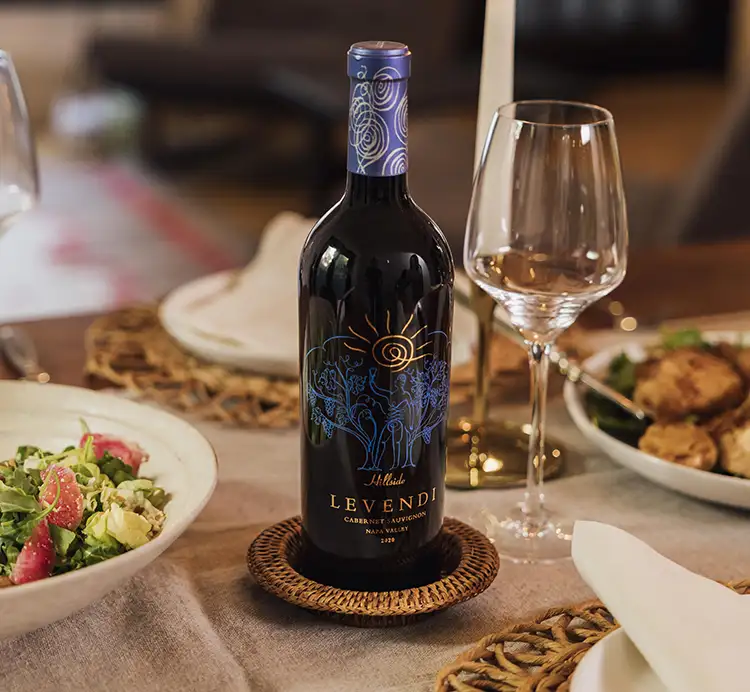 mobile image Levendi wine on a dinner table.